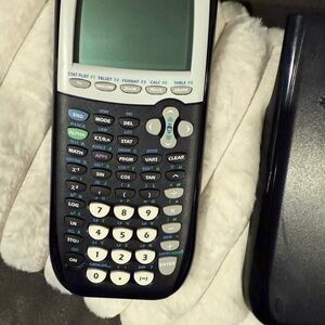 T-I 84 Plus Graphing Calculator with Black and White Design